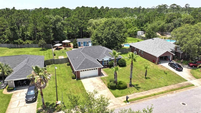 1701 Lighthouse Pointe Dr, Gulf Breeze, FL 32563 - view from above of property with a heavily wooded area