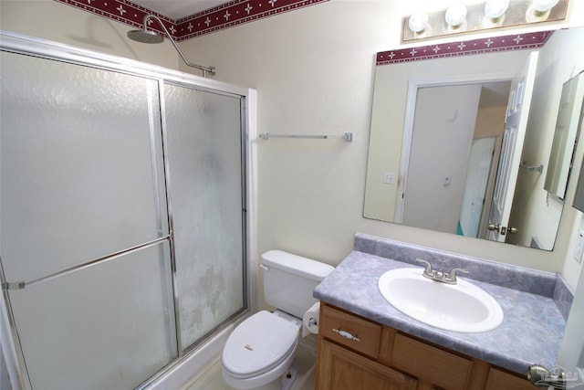 1701 Lighthouse Pointe Dr, Gulf Breeze, FL 32563 - full bath featuring a shower stall, vanity, and toilet