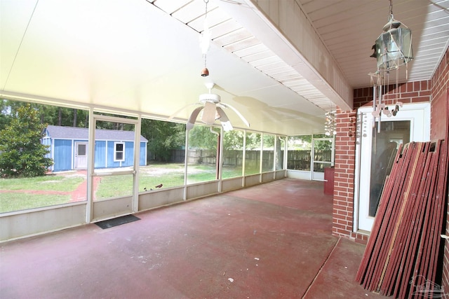 1701 Lighthouse Pointe Dr, Gulf Breeze, FL 32563 - unfurnished sunroom with ceiling fan and healthy amount of natural light