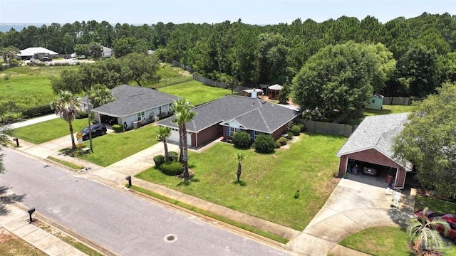 1701 Lighthouse Pointe Dr, Gulf Breeze, FL 32563 - view of subject property with a heavily wooded area