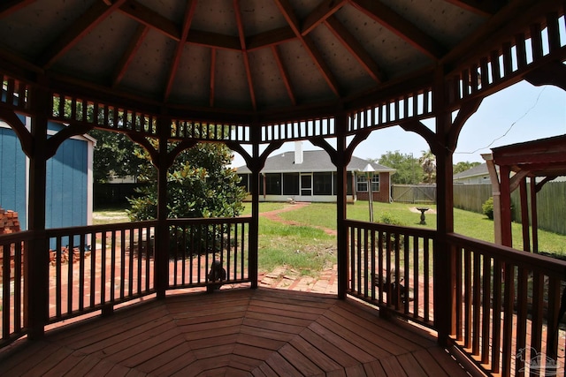 1701 Lighthouse Pointe Dr, Gulf Breeze, FL 32563 - wooden terrace with a gazebo