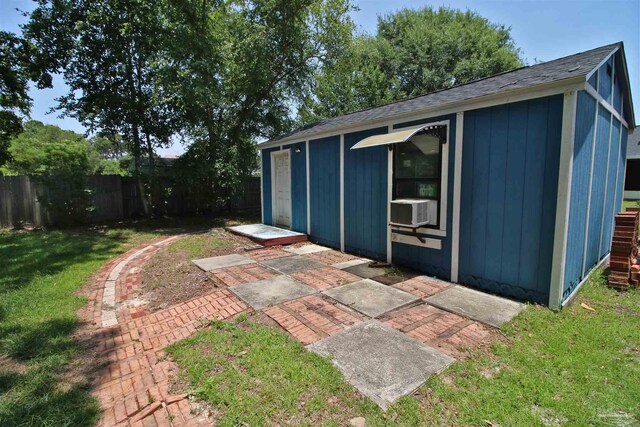 1701 Lighthouse Pointe Dr, Gulf Breeze, FL 32563 - view of outdoor structure featuring cooling unit