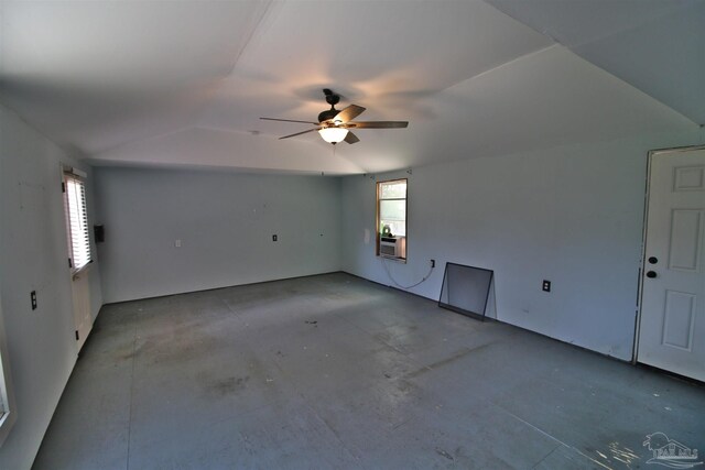 1701 Lighthouse Pointe Dr, Gulf Breeze, FL 32563 - spare room featuring unfinished concrete flooring and ceiling fan