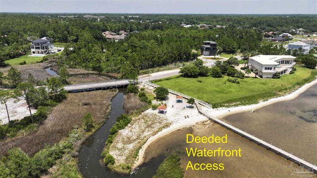 1701 Lighthouse Pointe Dr, Gulf Breeze, FL 32563 - aerial view of a forest