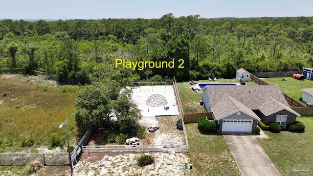 1701 Lighthouse Pointe Dr, Gulf Breeze, FL 32563 - aerial view of property and surrounding area featuring a heavily wooded area