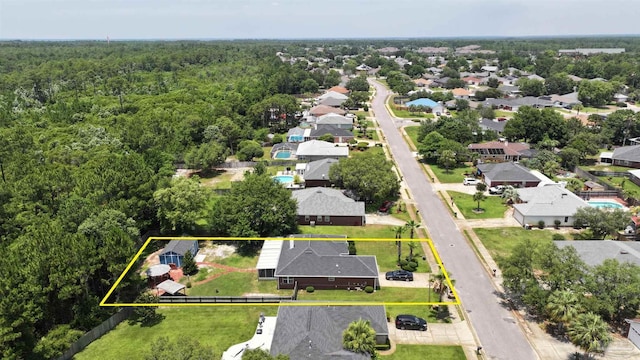 1701 Lighthouse Pointe Dr, Gulf Breeze, FL 32563 - aerial perspective of suburban area featuring a heavily wooded area and property boundaries highlighted