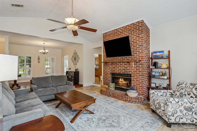 living area with lofted ceiling, a fireplace, visible vents, baseboards, and ornamental molding