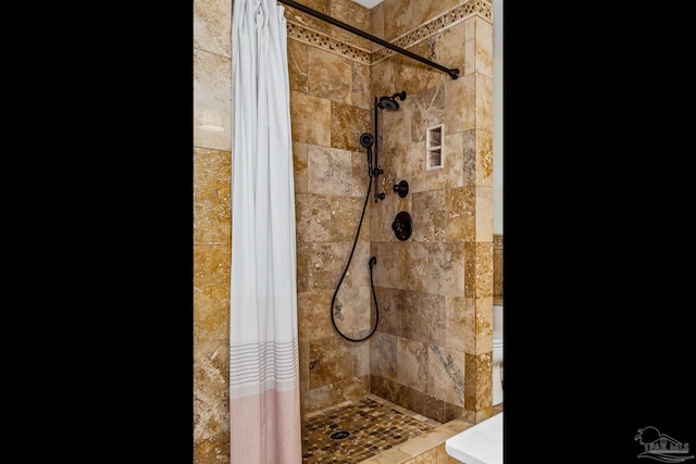 bathroom with a stall shower