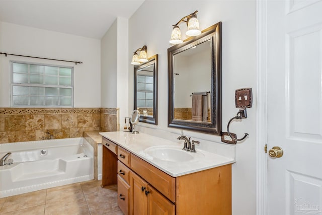 full bath with a bath, tile patterned flooring, double vanity, and a sink