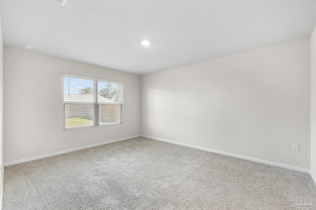 view of carpeted spare room