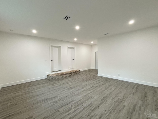 interior space with dark hardwood / wood-style floors