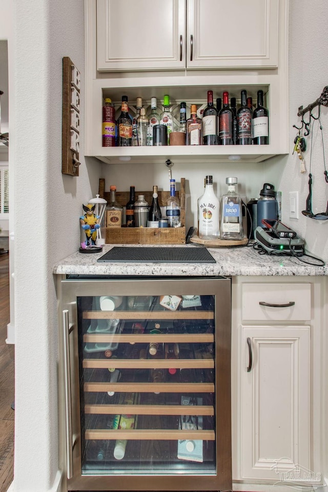 indoor dry bar with wine cooler