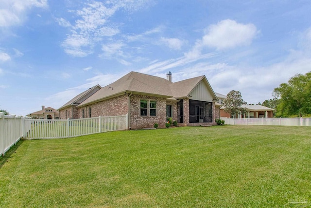 back of house with brick siding