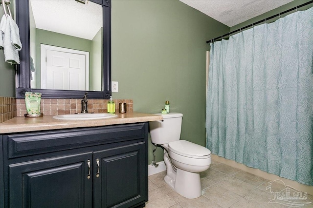 bathroom with vanity, toilet, a textured ceiling, tile patterned floors, and backsplash