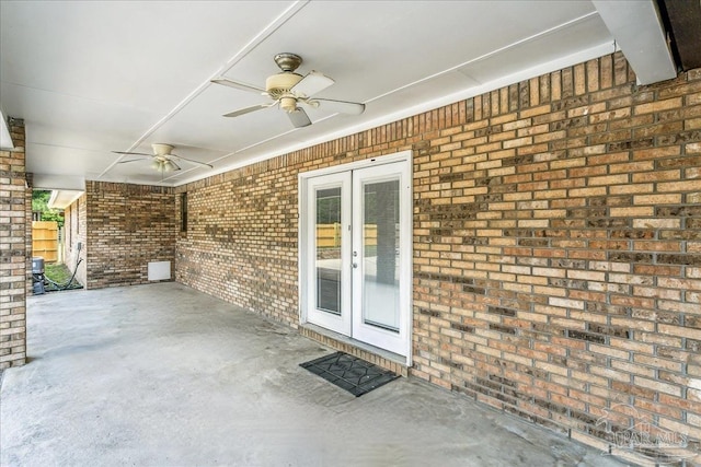view of patio / terrace featuring ceiling fan and french doors