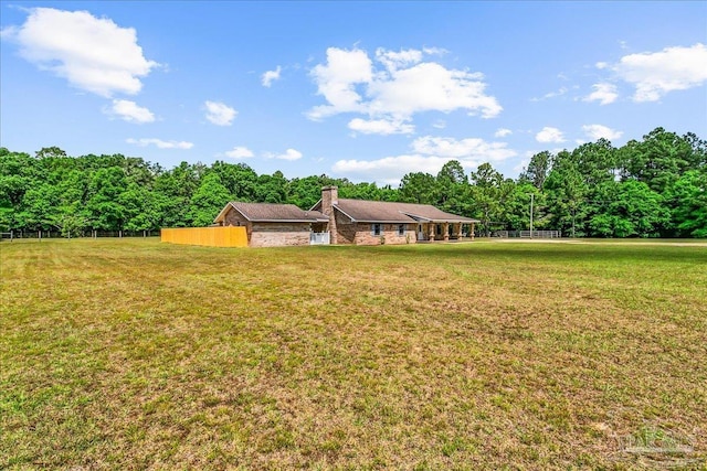 view of yard featuring fence