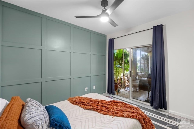 bedroom featuring ceiling fan and access to exterior