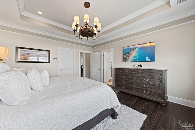 bedroom featuring baseboards, ornamental molding, a raised ceiling, wood tiled floor, and an inviting chandelier