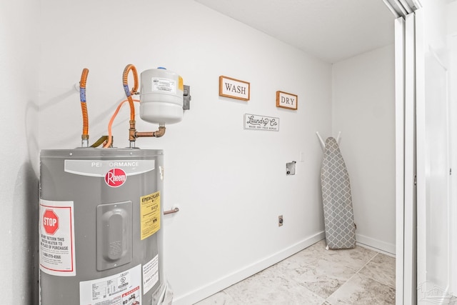 utility room with electric water heater