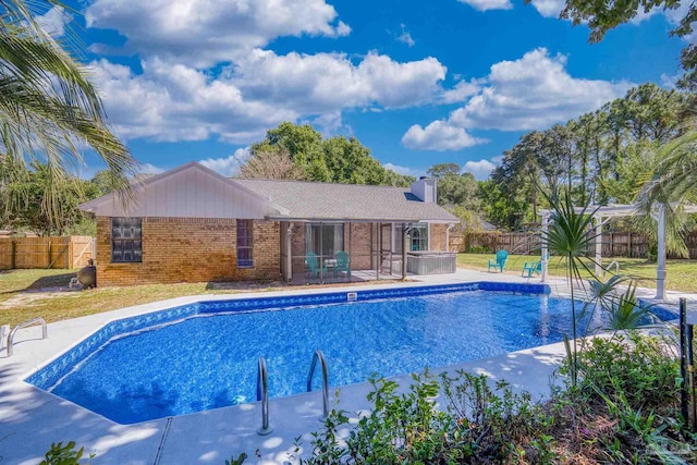 view of swimming pool with a patio