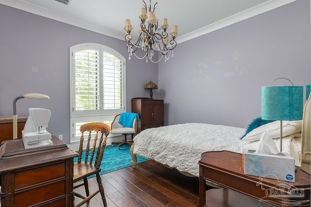 3063 Bay St, Gulf Breeze, FL 32563 - bedroom with wood-type flooring, a chandelier, and crown molding