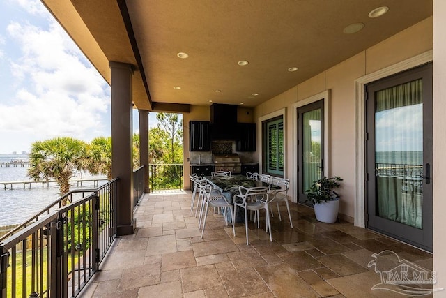 3063 Bay St, Gulf Breeze, FL 32563 - view of patio / terrace featuring a water view and outdoor dining area