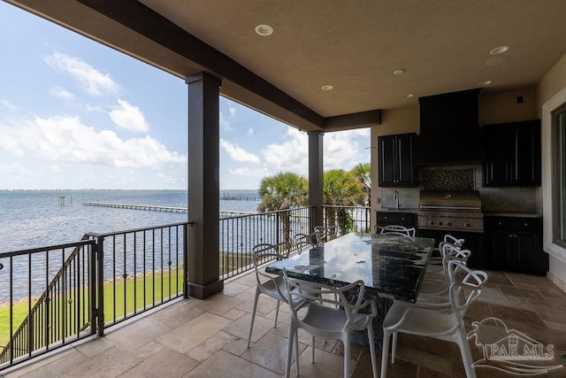 3063 Bay St, Gulf Breeze, FL 32563 - view of patio / terrace with a water view, a grill, and a sink