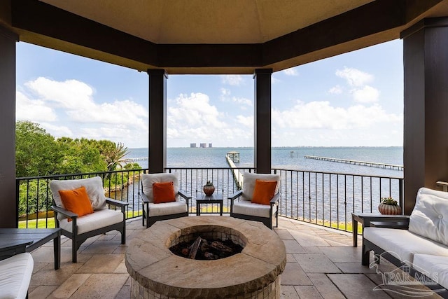 3063 Bay St, Gulf Breeze, FL 32563 - view of patio / terrace with a water view and an outdoor fire pit