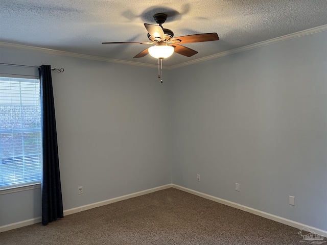 carpeted empty room featuring ornamental molding, ceiling fan, a textured ceiling, and baseboards