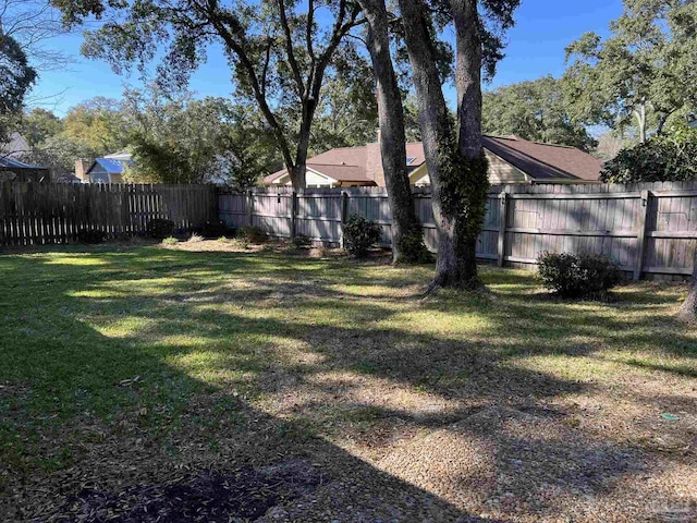 view of yard featuring fence