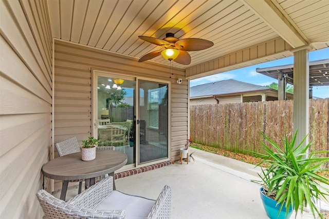 5853 Fairlands Rd, Milton, FL 32583 - view of patio / terrace featuring ceiling fan and fence