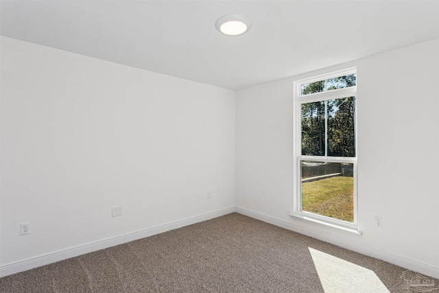 view of carpeted spare room