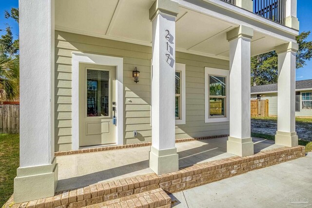 doorway to property with a porch