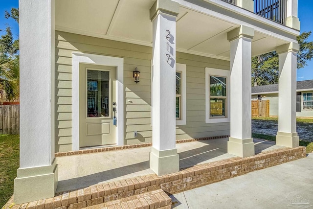 property entrance with a balcony