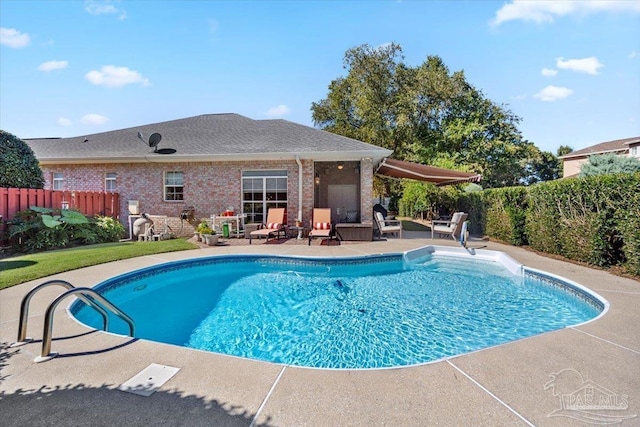 view of pool with a fenced in pool, a fenced backyard, and a patio area