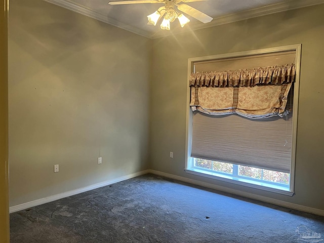 carpeted empty room with crown molding, baseboards, and a ceiling fan