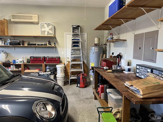 garage featuring washing machine and clothes dryer, a wall mounted AC, electric panel, and electric water heater