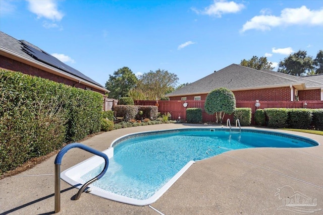view of pool featuring a fenced in pool, a fenced backyard, and a patio area