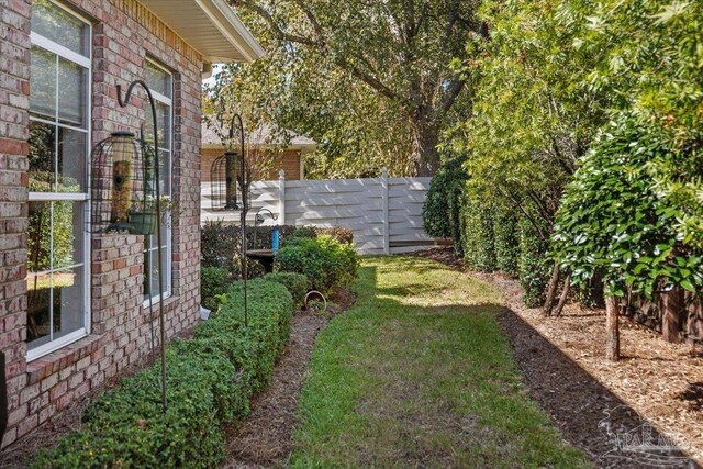 view of yard with fence