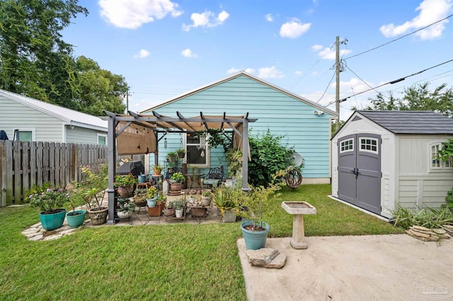 view of yard featuring a pergola, a storage unit, and a patio area