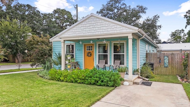 bungalow with a front lawn