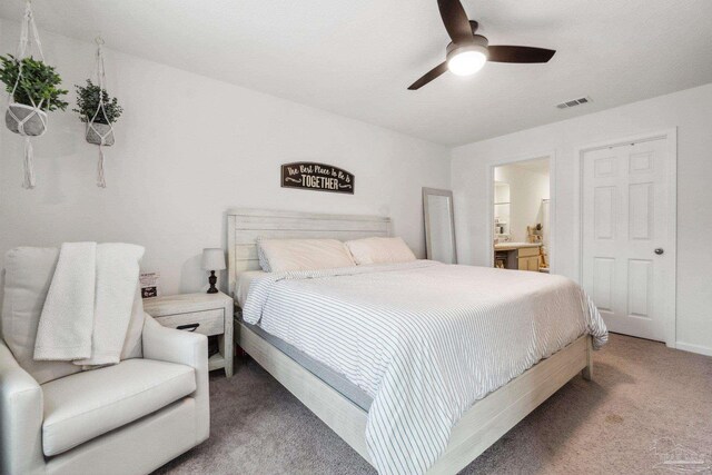 4348 Jitterbug St, Milton, FL 32583 - bedroom featuring light carpet, ensuite bathroom, and ceiling fan