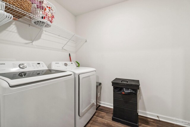 4348 Jitterbug St, Milton, FL 32583 - laundry area with washer and clothes dryer, dark wood-style floors, and baseboards