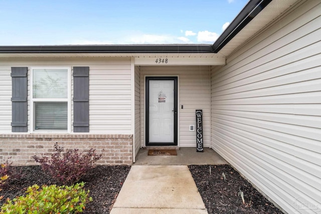 4348 Jitterbug St, Milton, FL 32583 - property entrance with brick siding