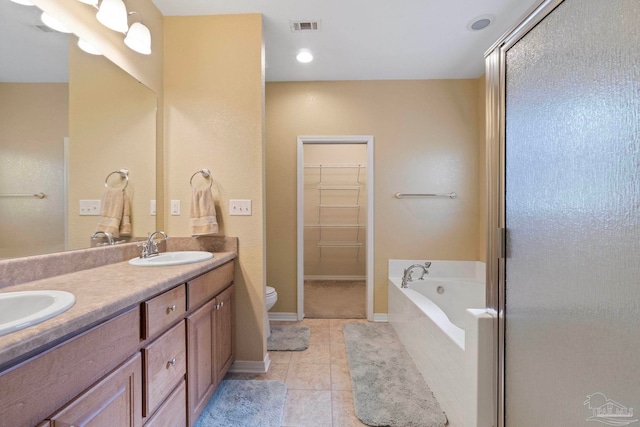 full bathroom featuring toilet, tile patterned floors, vanity, and independent shower and bath