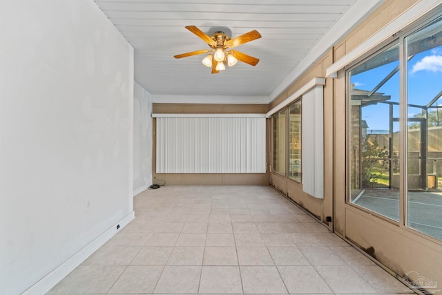 interior space with ceiling fan