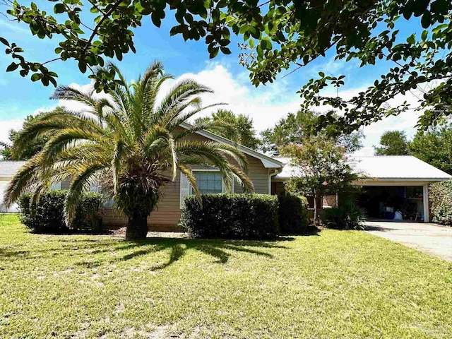 view of front facade with a garage and a front lawn