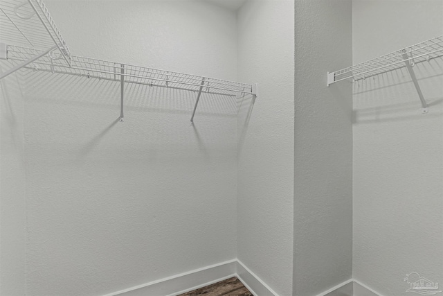 214 Thayer Ave, Pensacola, FL 32507 - walk in closet featuring dark wood-style floors