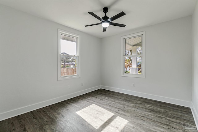 214 Thayer Ave, Pensacola, FL 32507 - empty room featuring dark wood-style flooring, baseboards, and ceiling fan