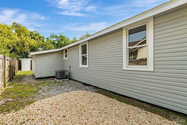 214 Thayer Ave, Pensacola, FL 32507 - back of property with central air condition unit and fence